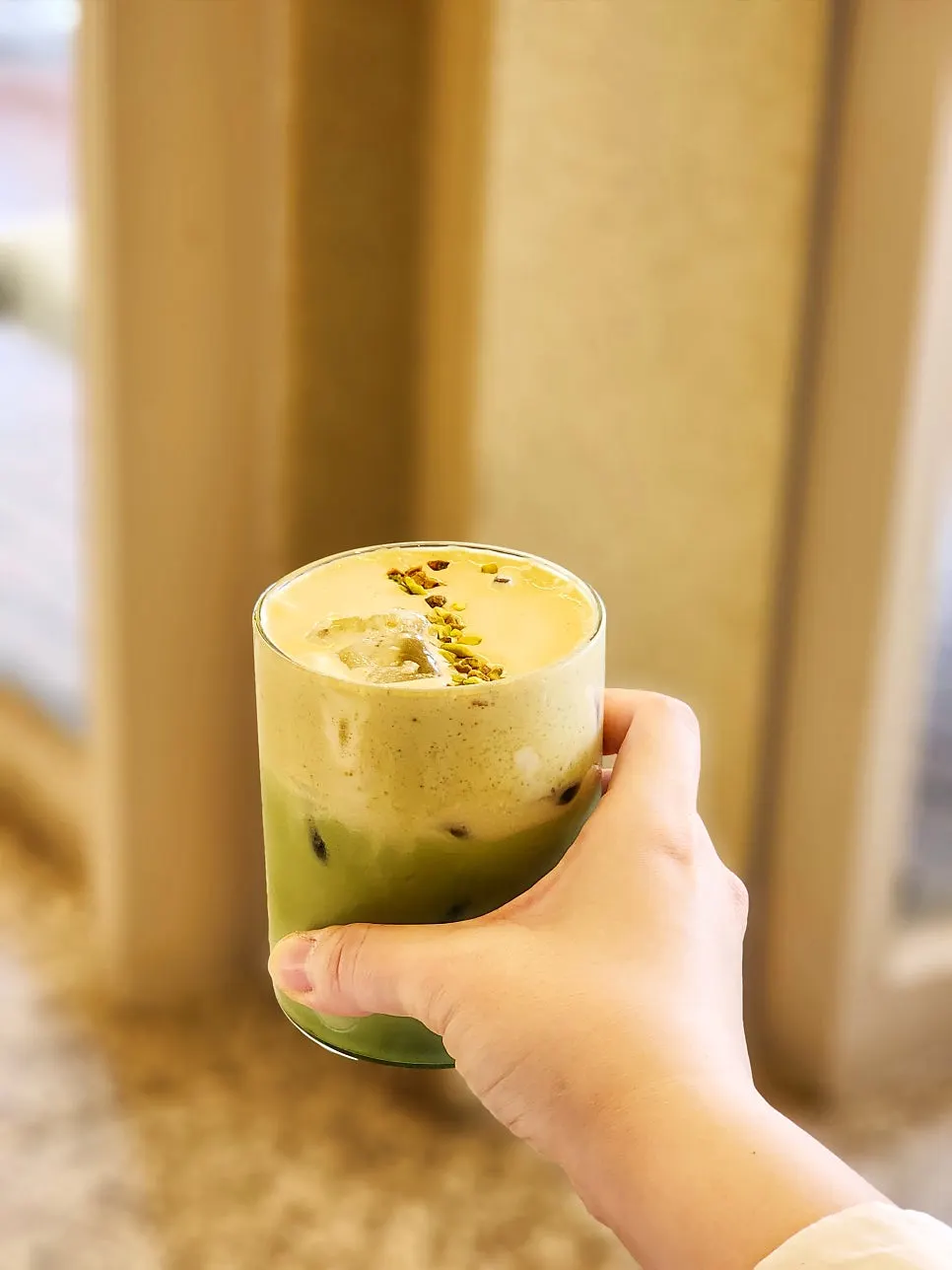 Close-up of the matcha pistachio cream latte