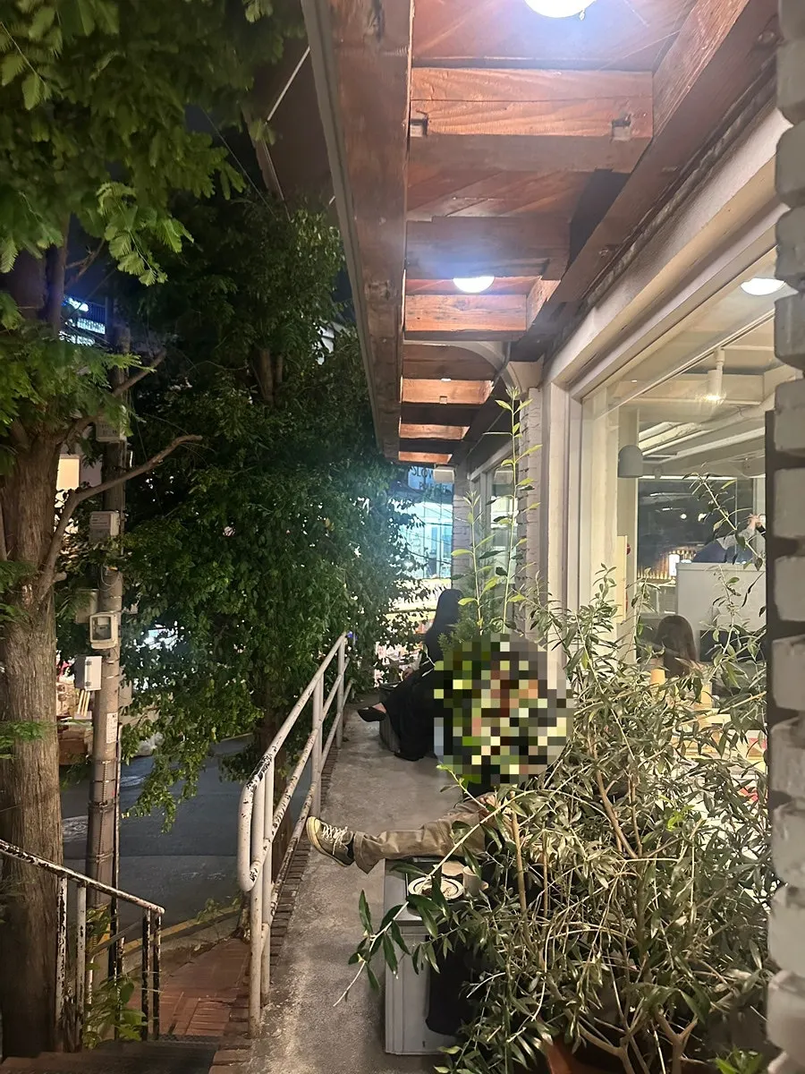 2nd-floor terrace at Upper and Under surrounded by trees