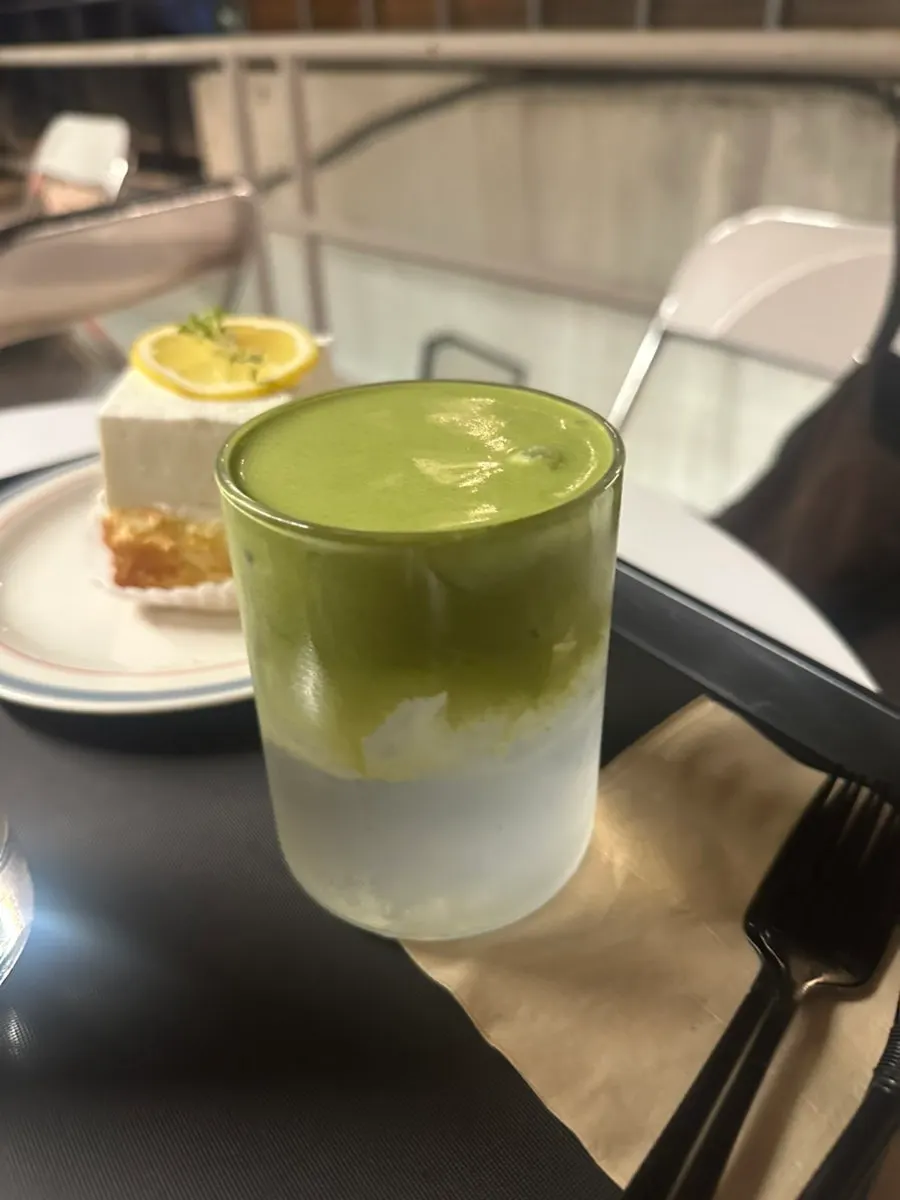 Close-up of coconut matcha before mixing in the cream