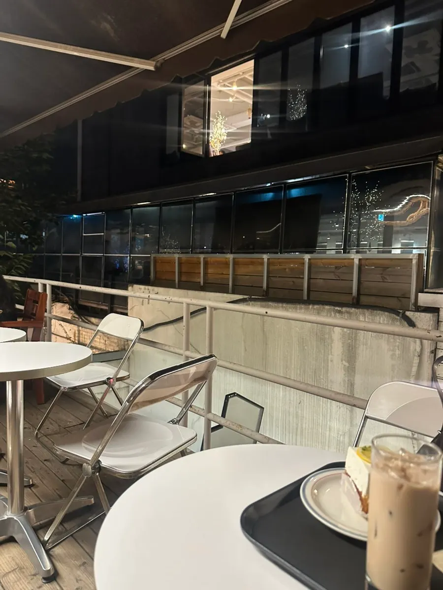Night view from the 3rd-floor terrace at Upper and Under