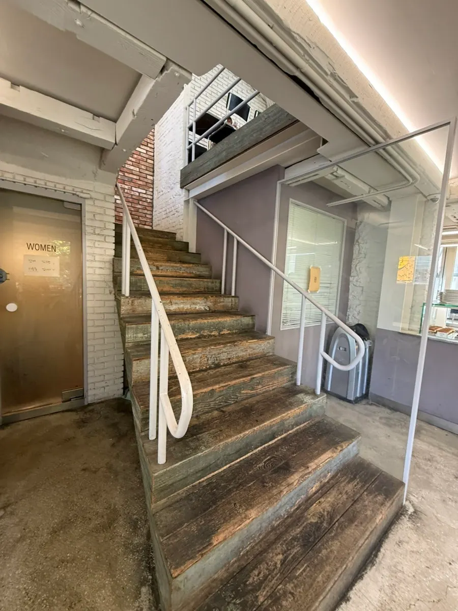 Interior of Upper and Under's large café spanning 1st to 3rd floor