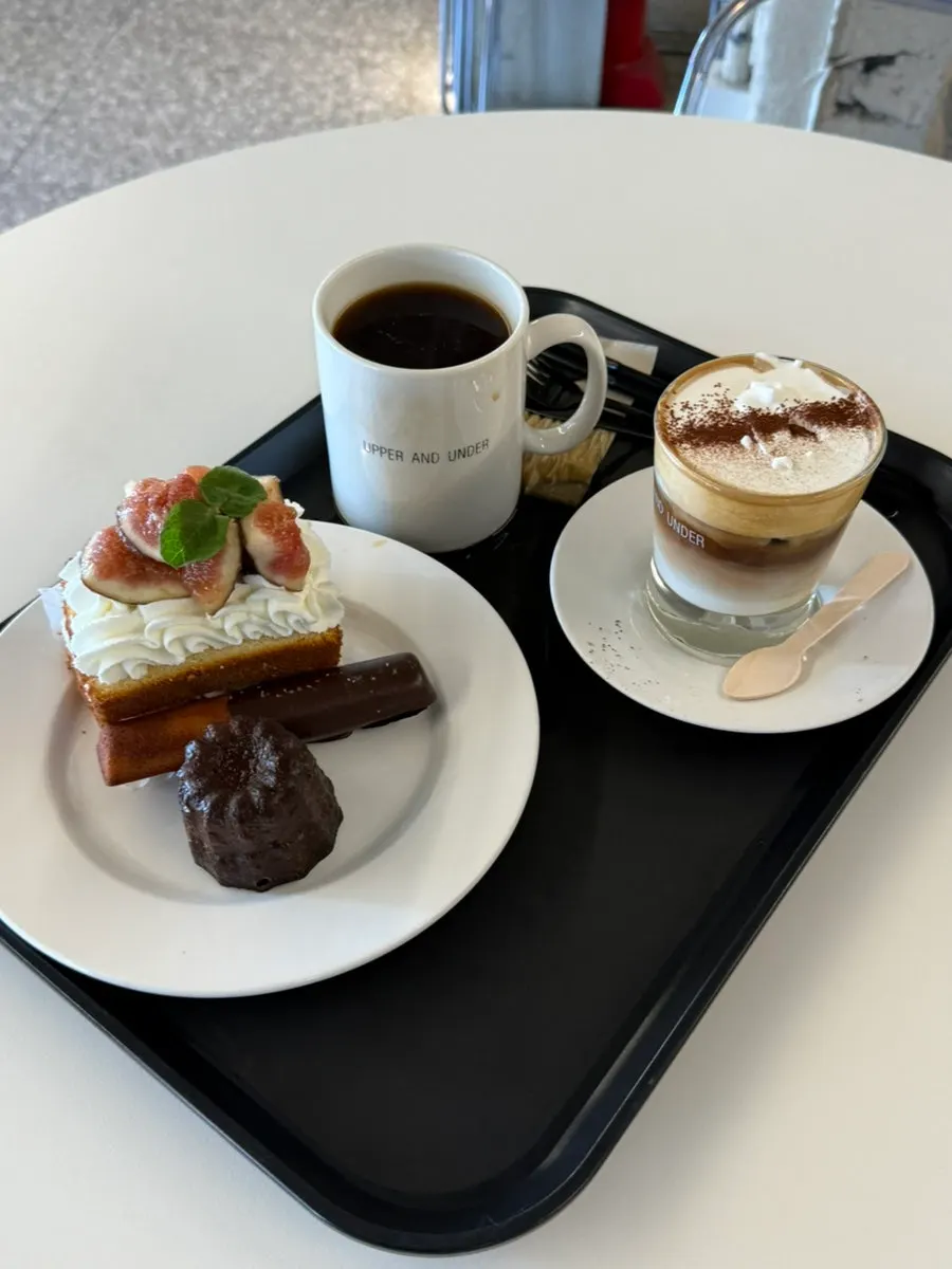 Cake showcase at Upper and Under