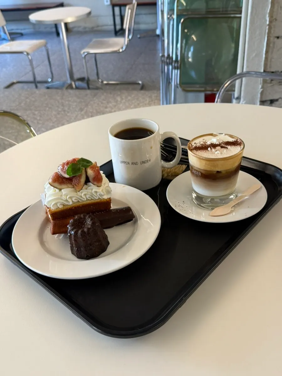 Tiramisu and fruit cakes on display