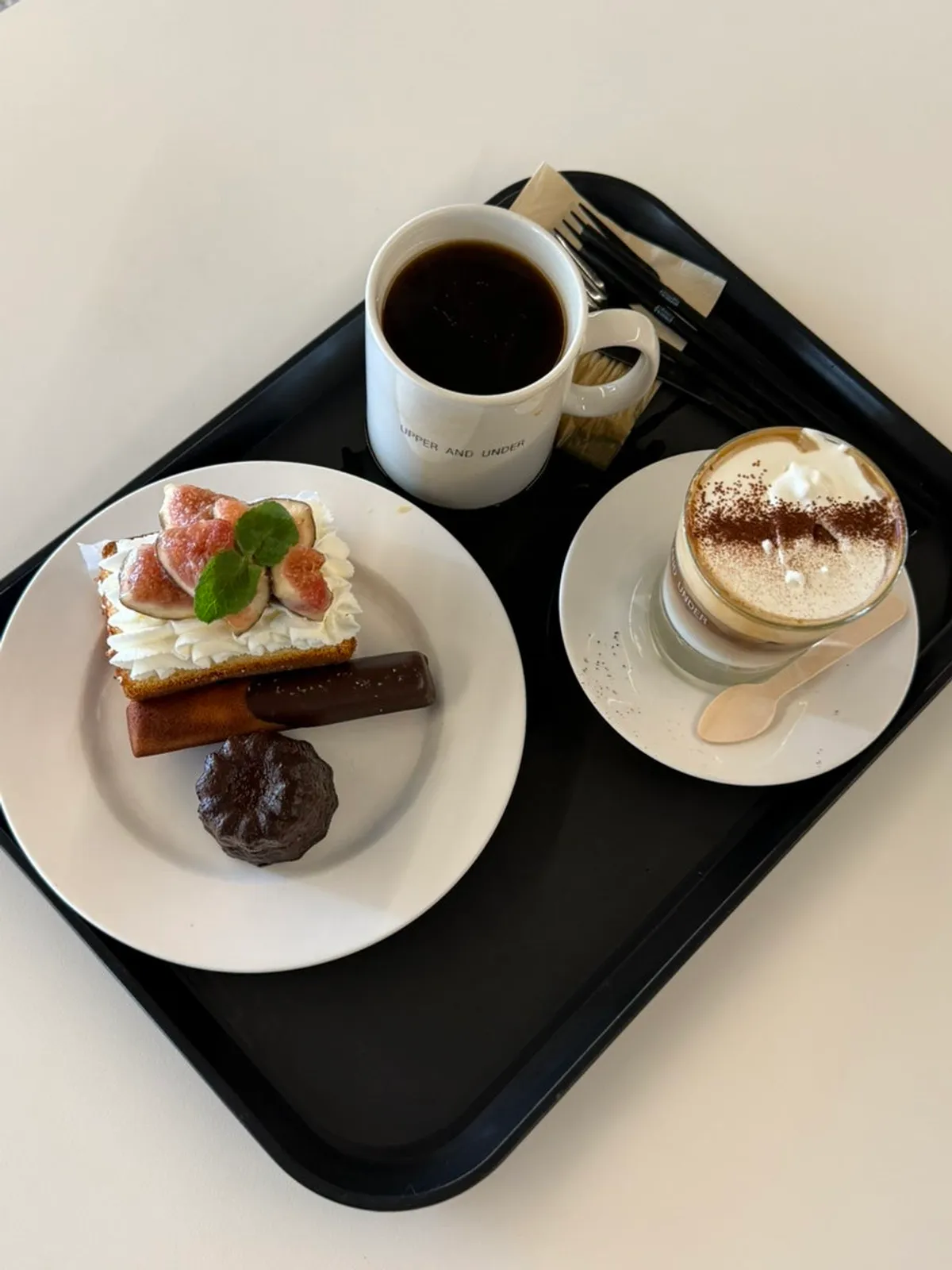 Upper and Under's fig cake topped with cream and fig