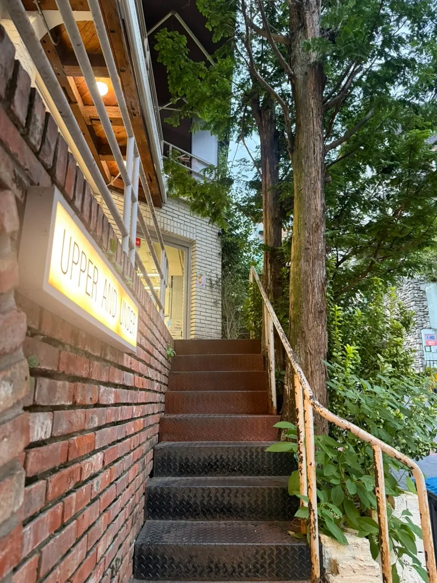 Upper and Under's entrance on the front right