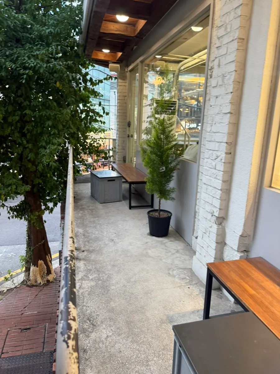 Outdoor tables on the way up to the 2nd floor