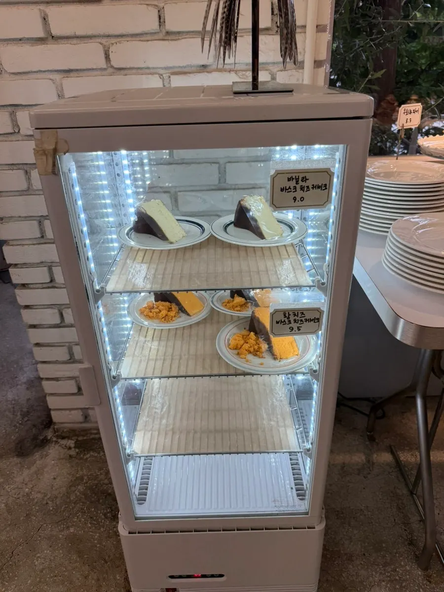 Cheesecake and baked goods display case