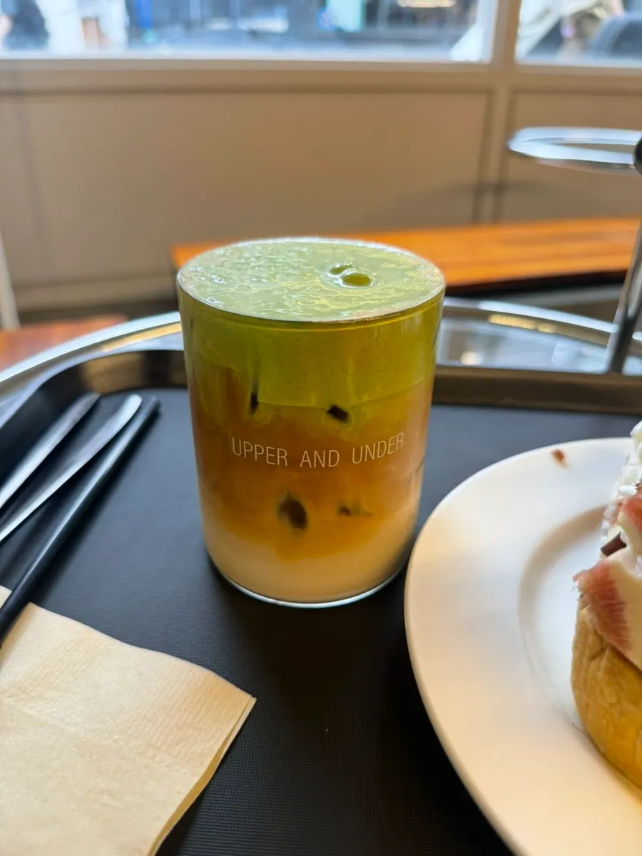 Matcha cream oat latte and fig desserts on the table