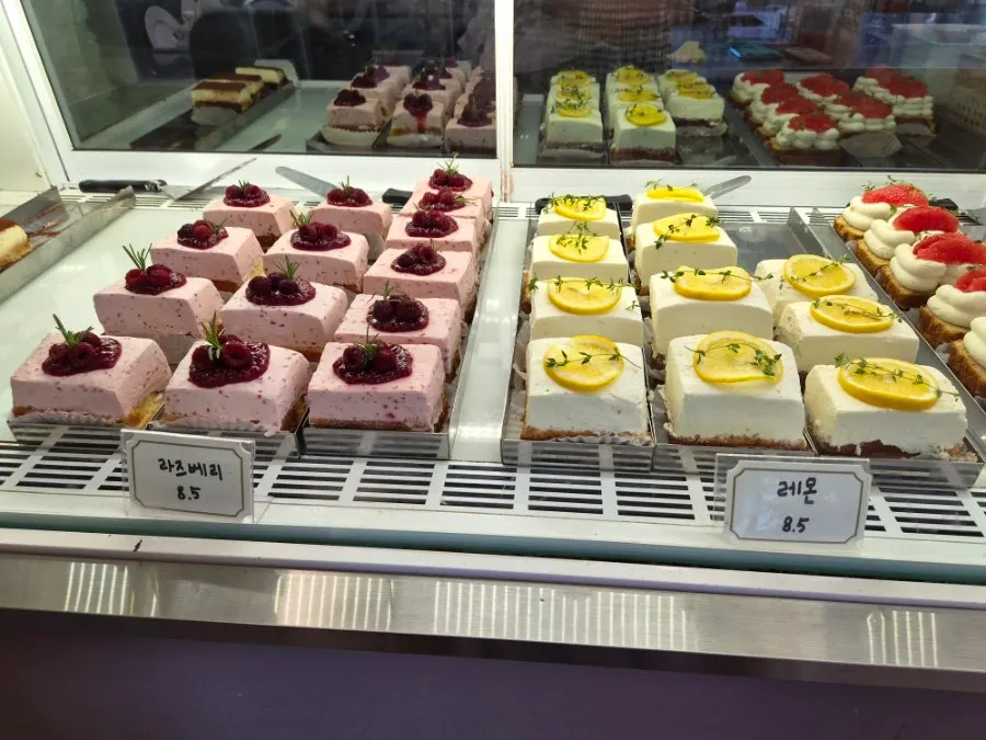 Tiramisu and lemon cakes on display