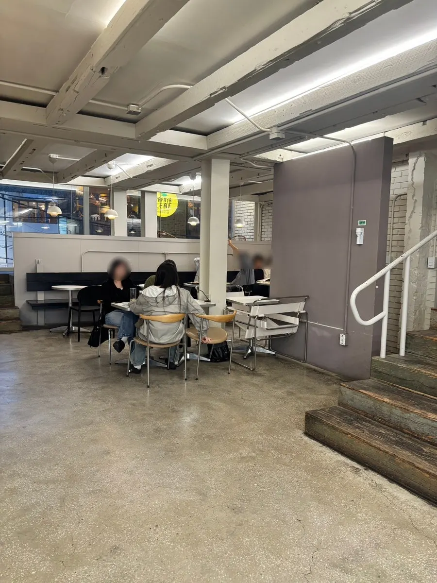 Stairs beside the building leading up to the 2nd floor ordering area