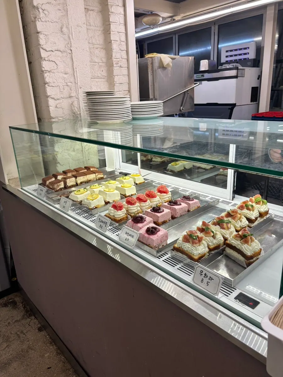 Cake showcase at Upper and Under