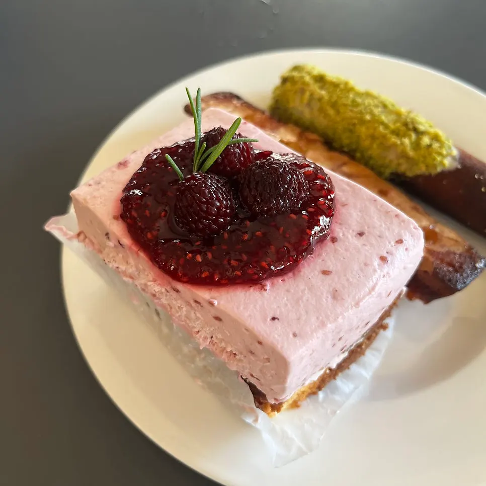 A slice of raspberry cake at Upper and Under