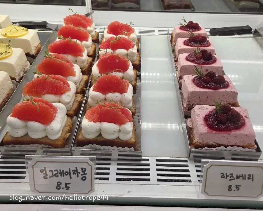 Tiramisu and fruit cakes in the display case