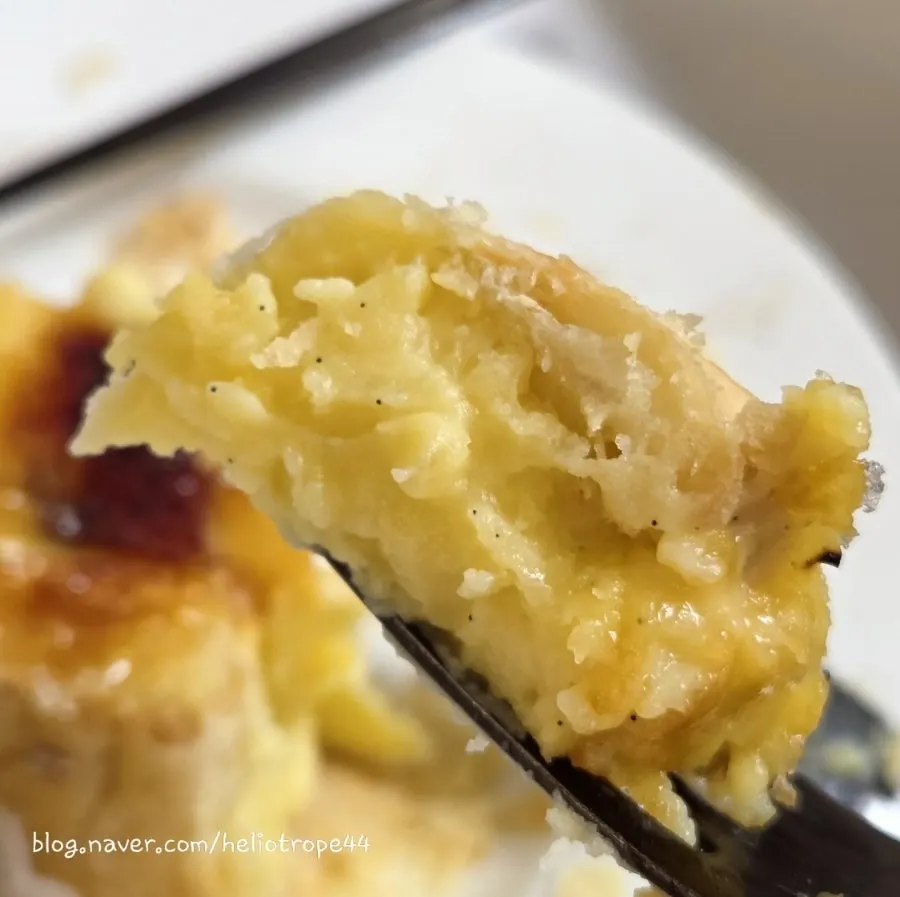 Crème brûlée flan cut in half showing vanilla bean specks