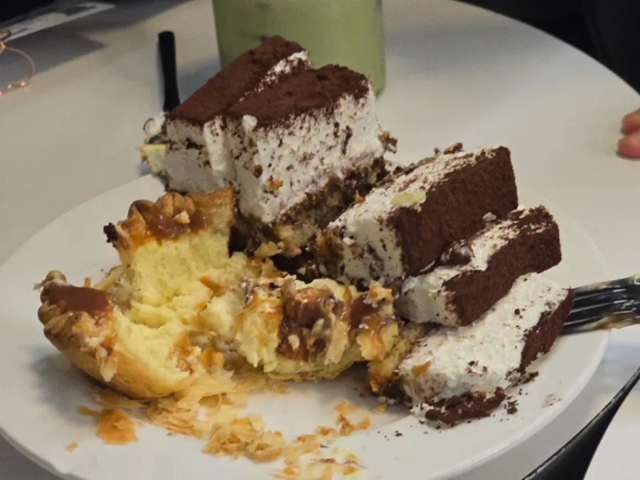 Tiramisu and caramel cheese pie cut into pieces