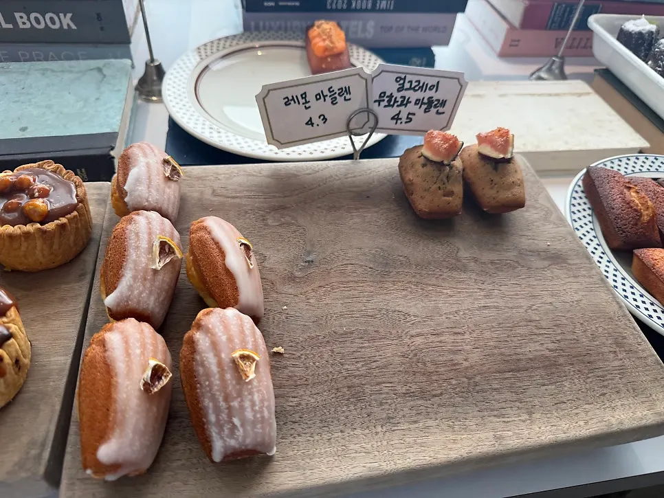 Showcase lined with cakes at Upper and Under