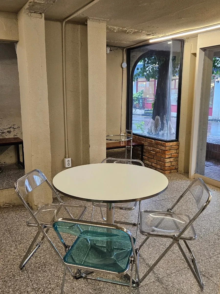 Table by the window on the 1st floor of Upper and Under