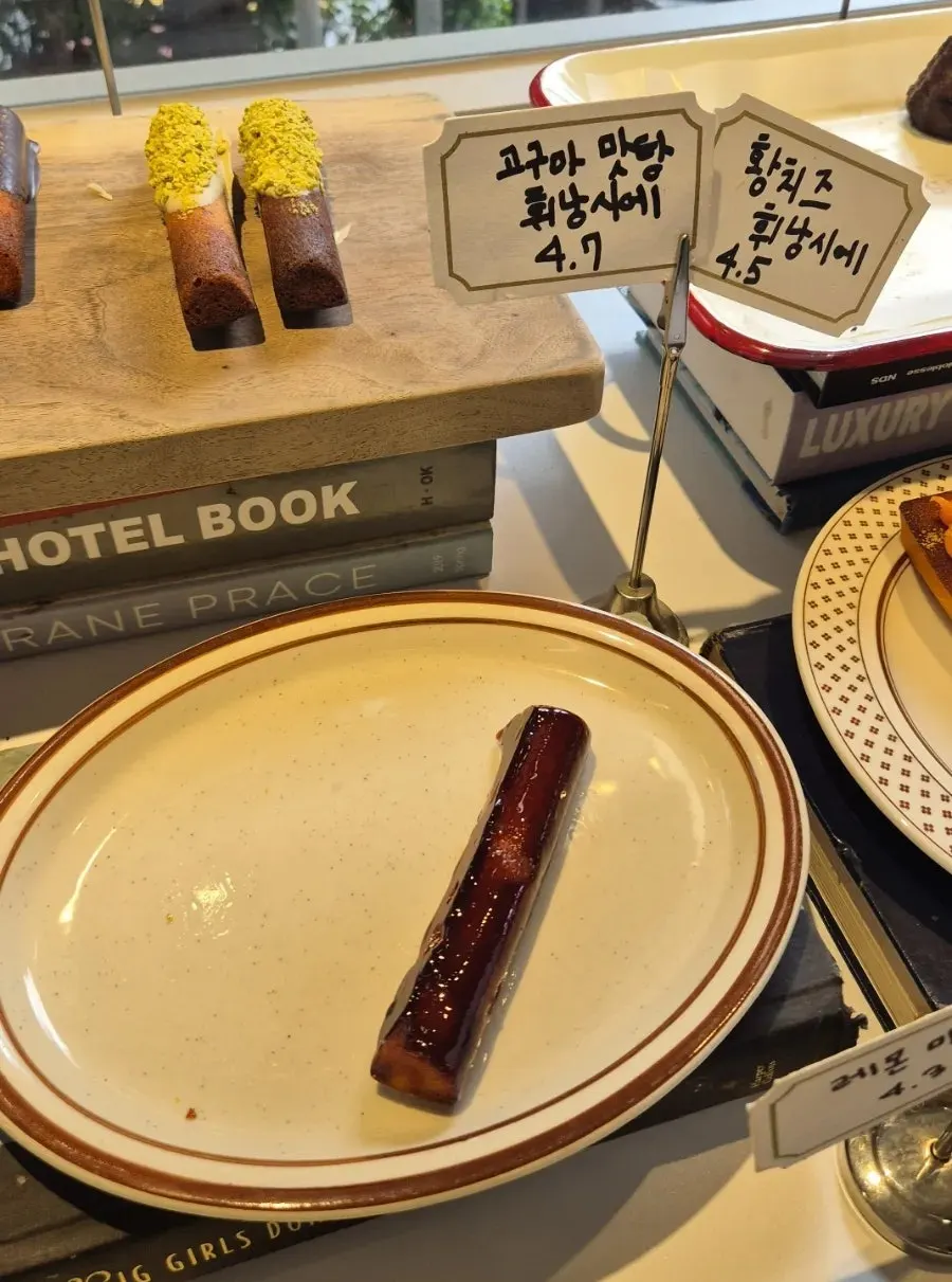 Slices of cake on display at Upper and Under