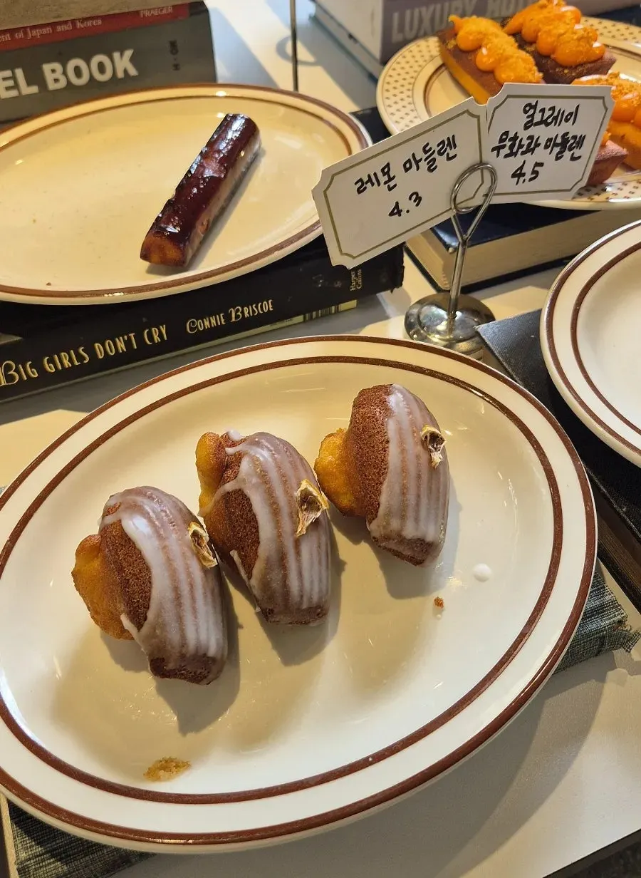 Desserts arranged in the display case