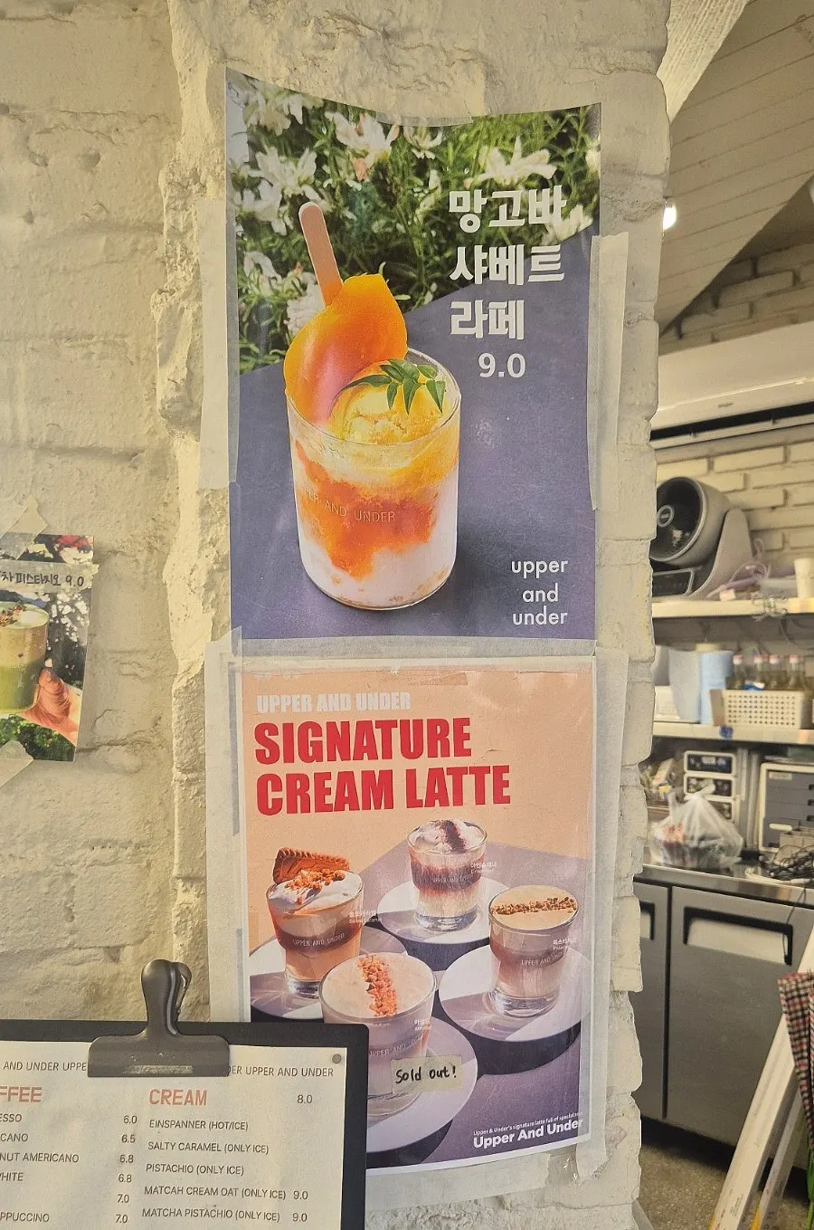 Mango bar sherbet latte with a whole mango bar inside
