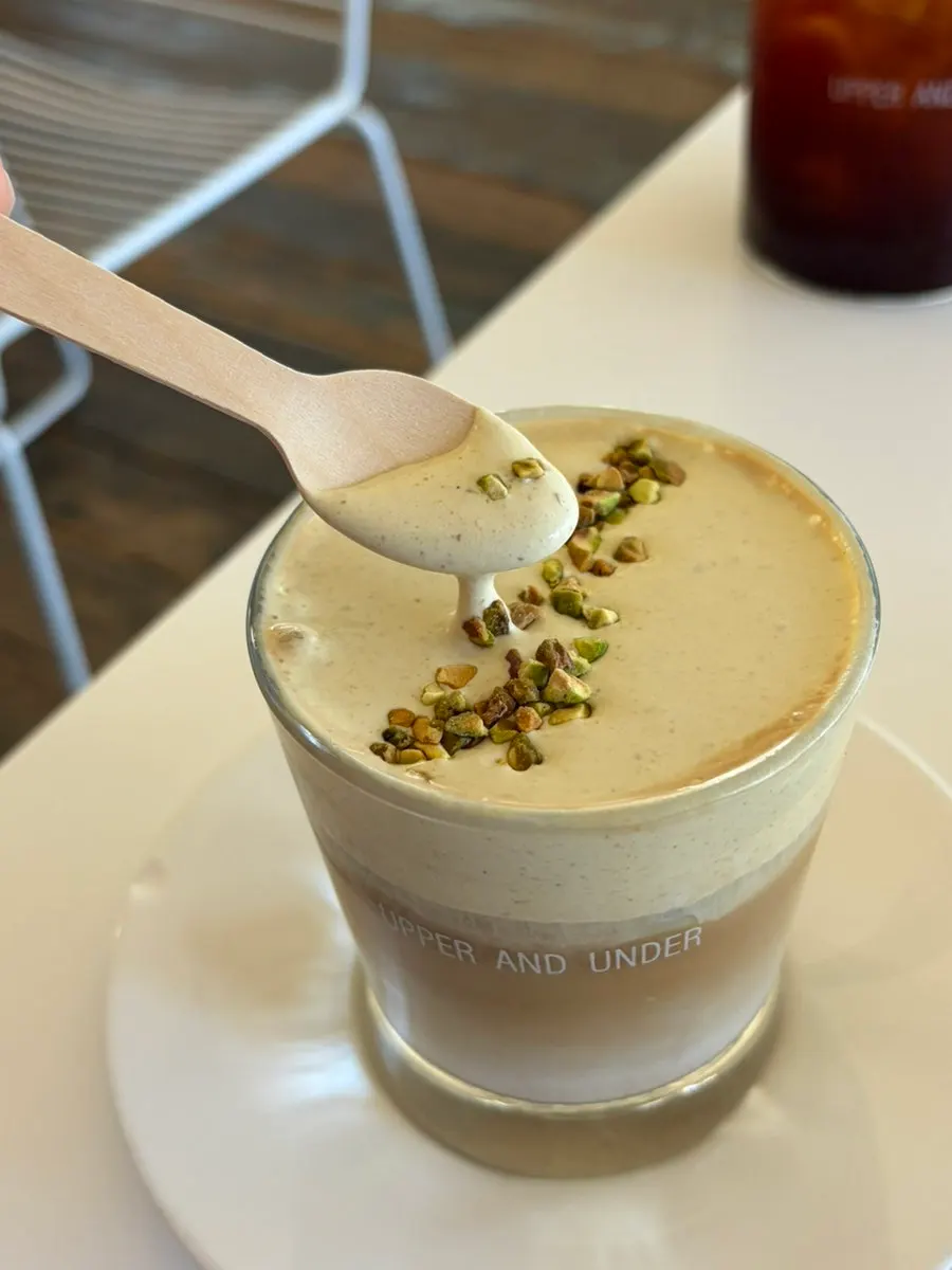 Close-up of pistachio cream latte