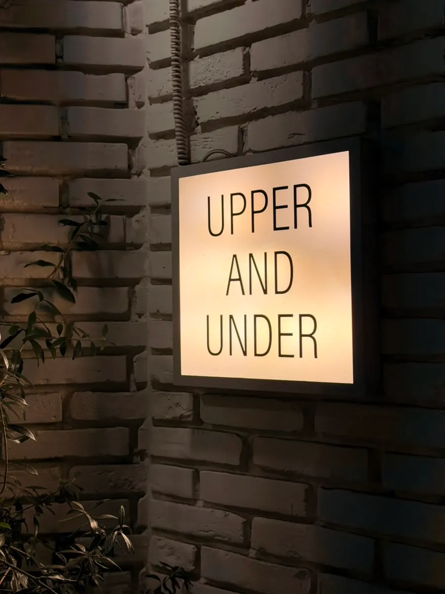 Entrance with the Upper and Under sign