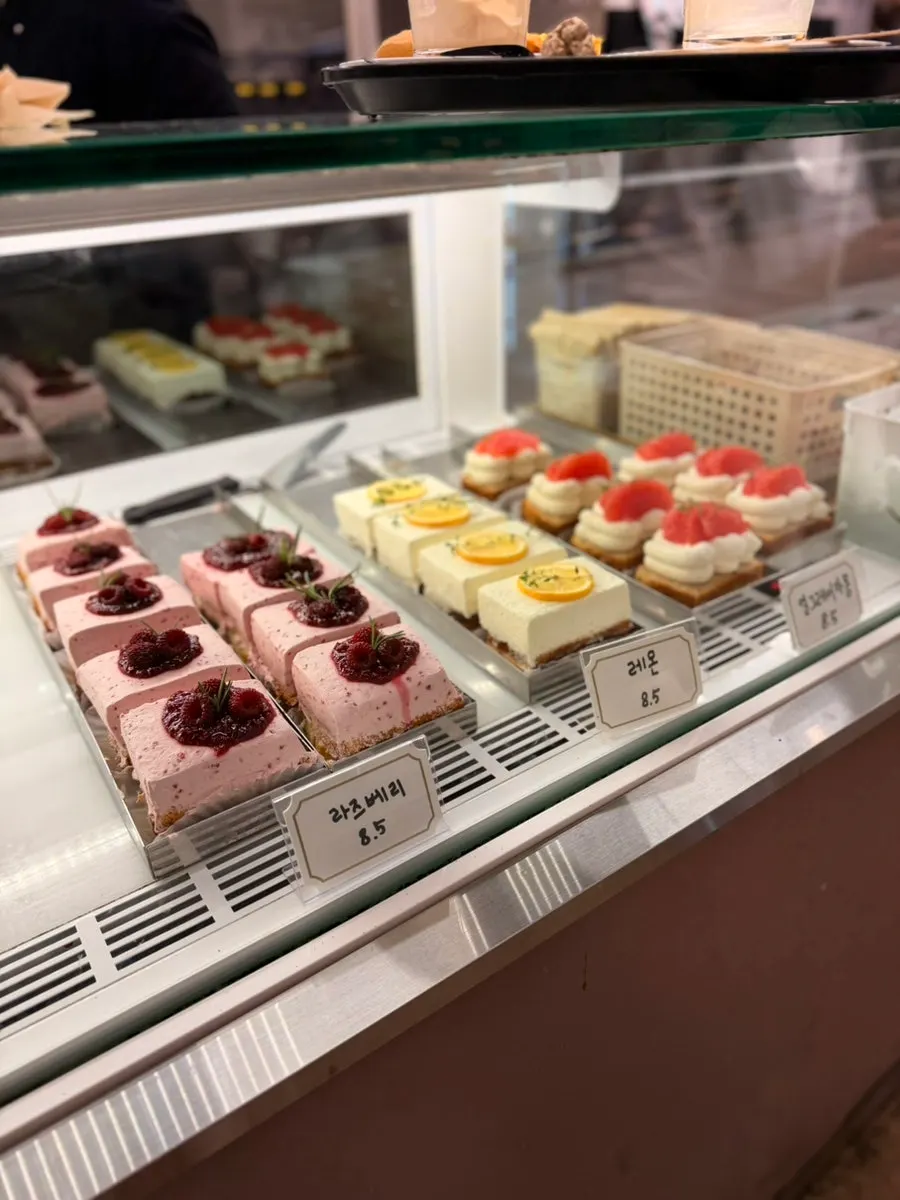 Display of tiramisu and citrus cream cakes