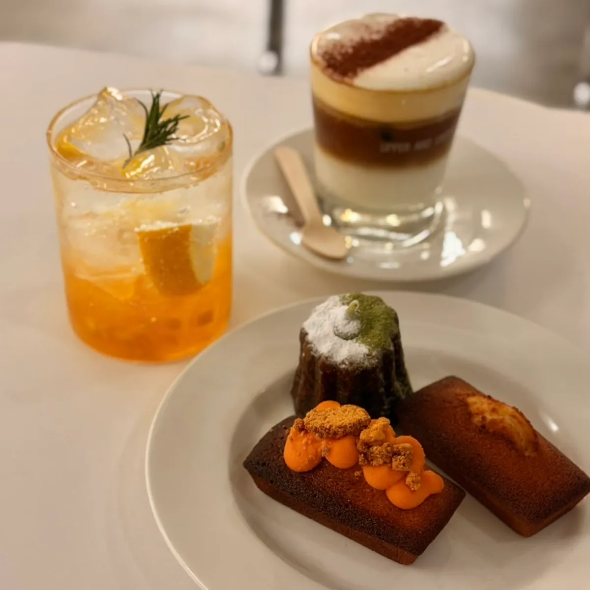 Drinks and desserts set on a table at Upper and Under