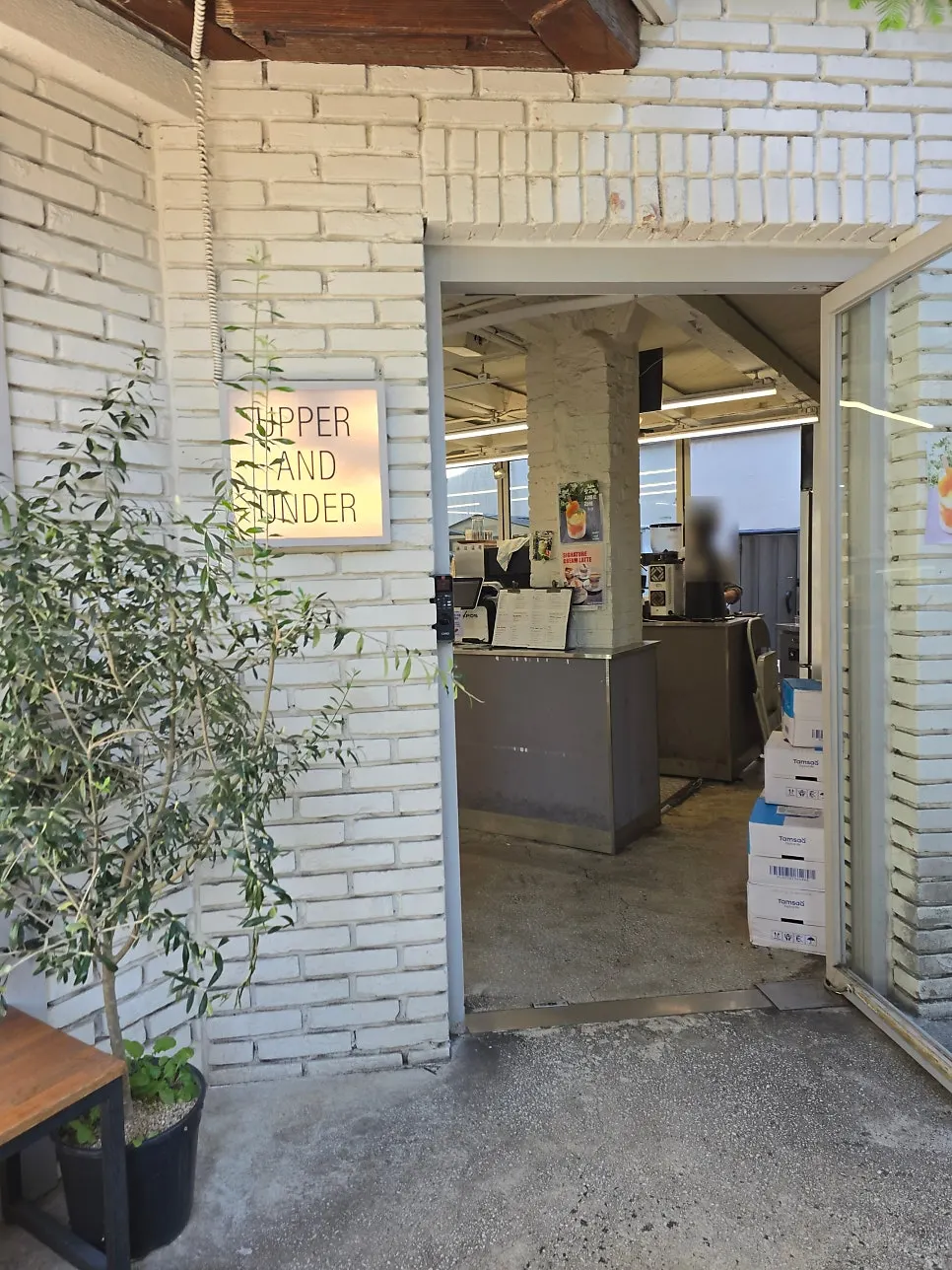 Entrance of the multi-floor Upper and Under café