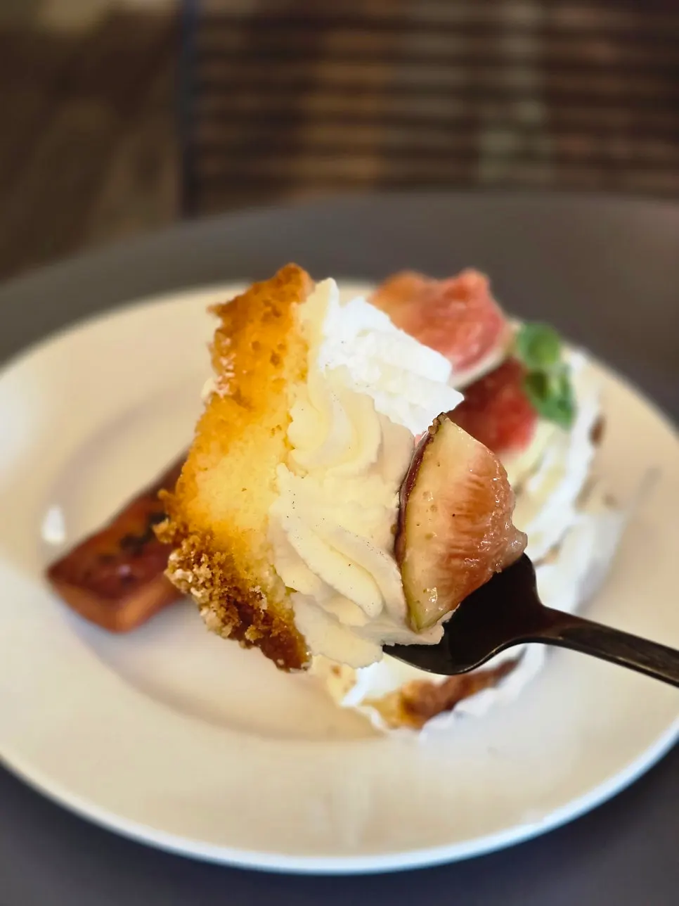 A forkful of fig cake being cut