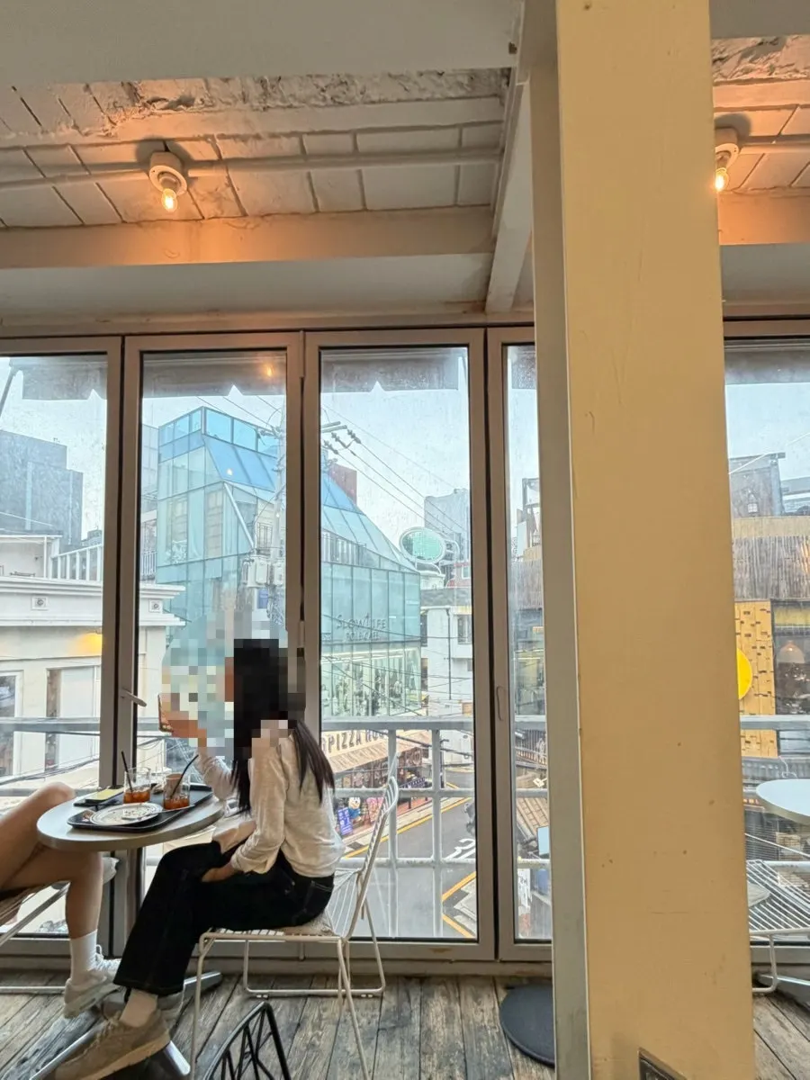 Area around the entrance of Upper and Under café