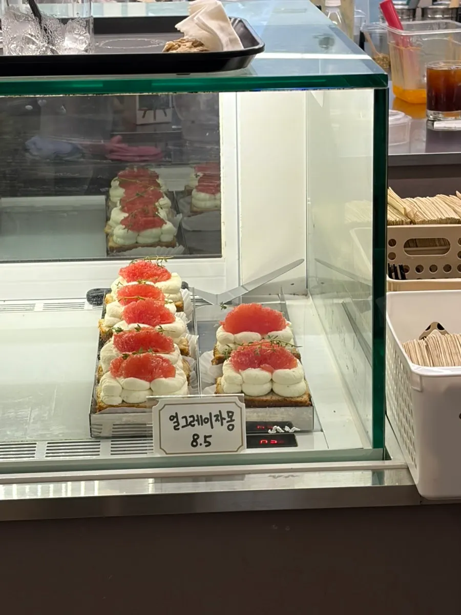 Full view of the dessert showcase at Upper and Under