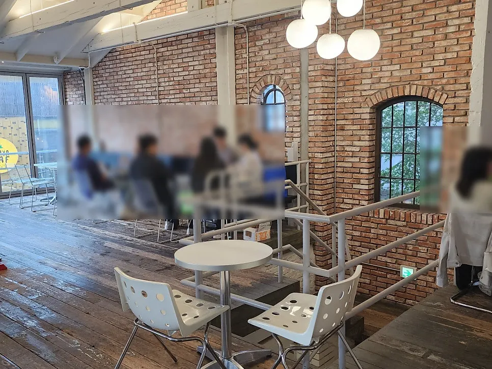 Seating in the brick-interior area of Upper and Under