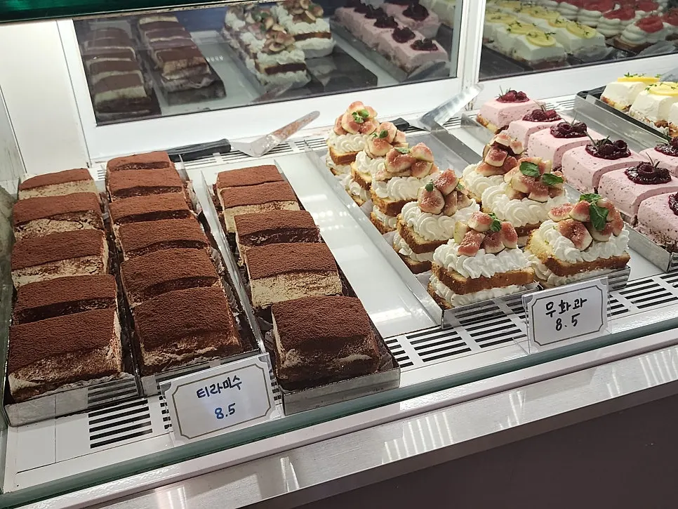 Canelés and petit desserts on display