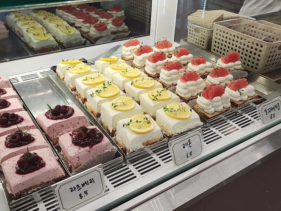 Various desserts arranged in the bakery showcase