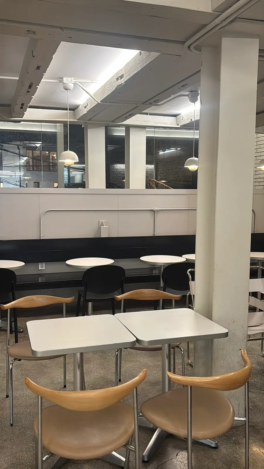Two-top seating on Upper and Under's ordering floor