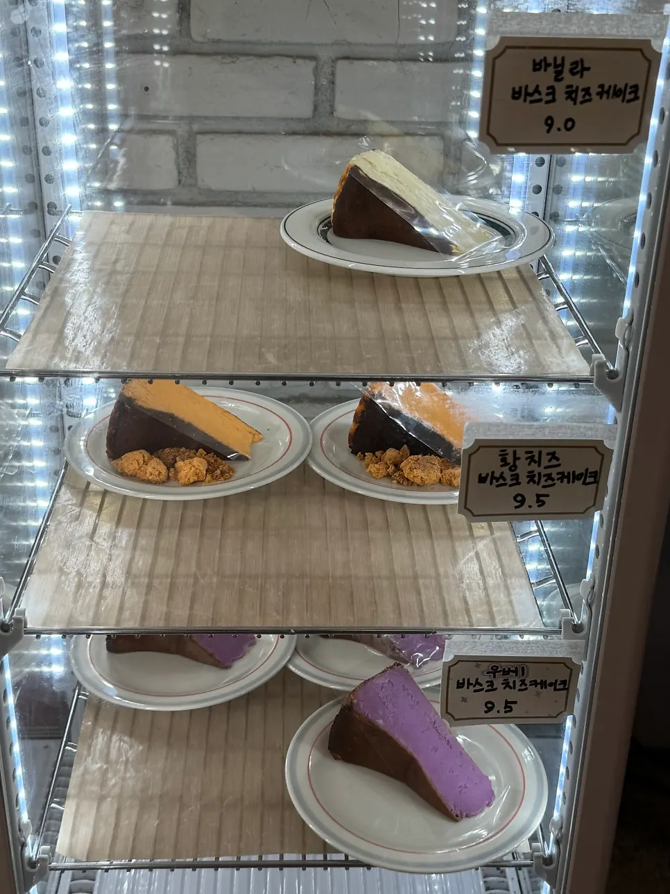 Basque cheesecakes in the display case
