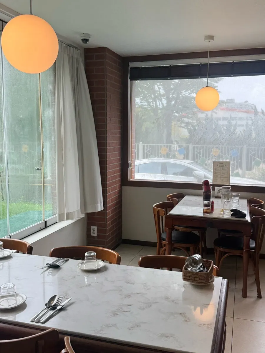 Seating at Upstairs Kitchen ranging from tables for two to six