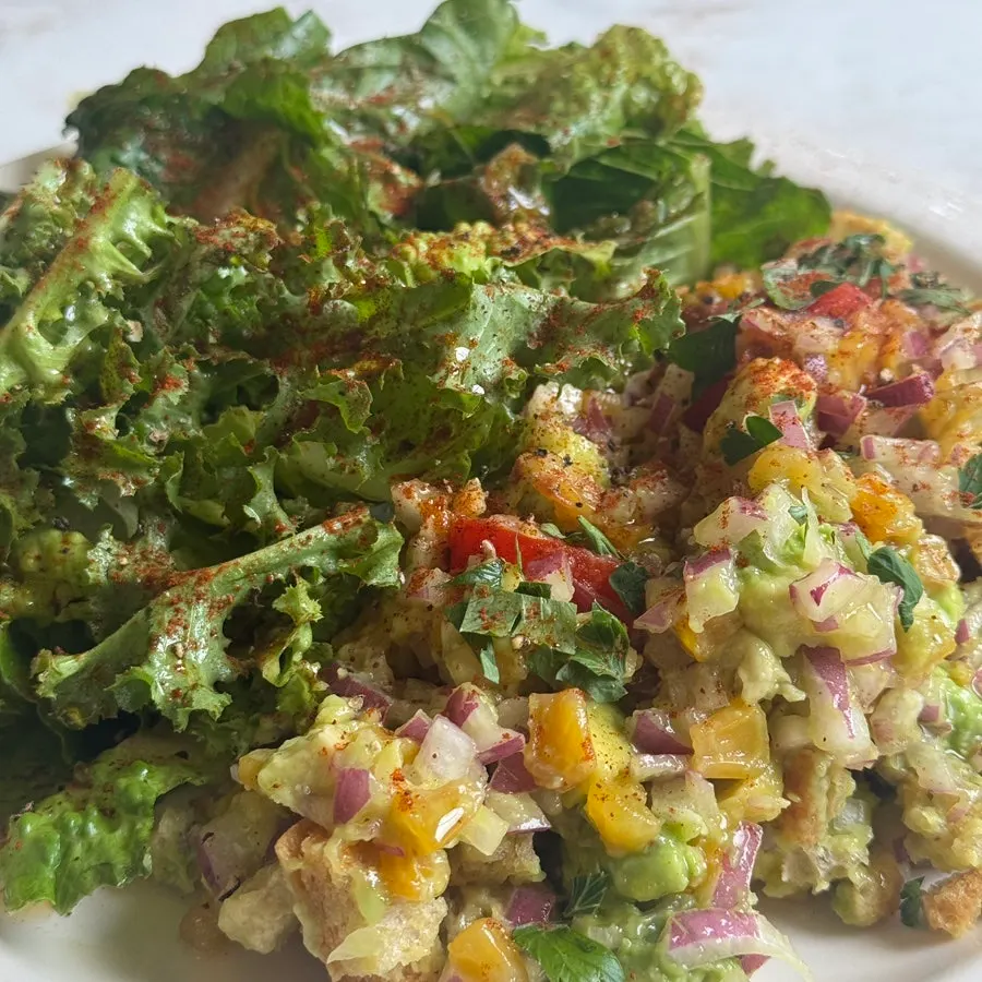 Guacamole salad with avocado and grilled corn