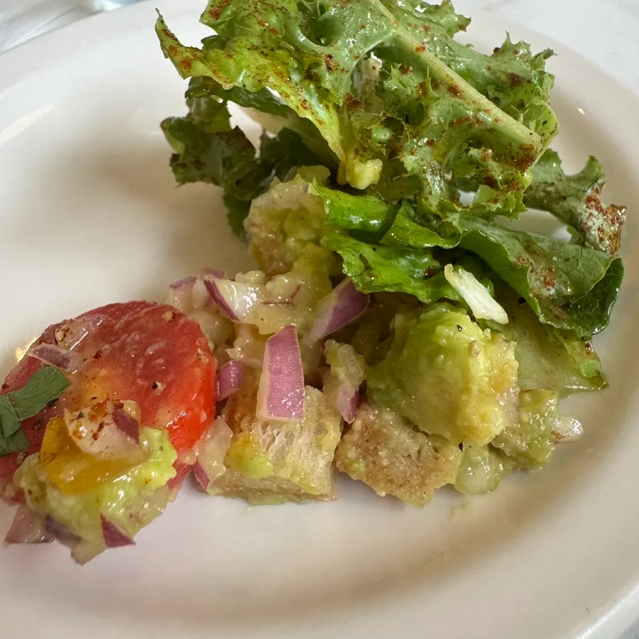 Close-up of guacamole salad topped with smoked paprika powder