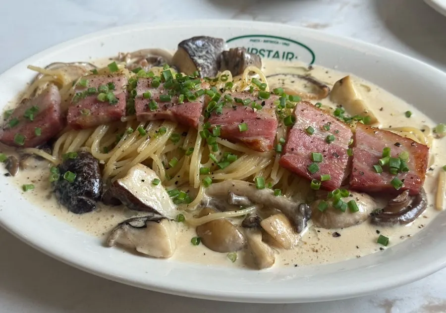 Plate of Upstairs Kitchen's mushroom cream pasta