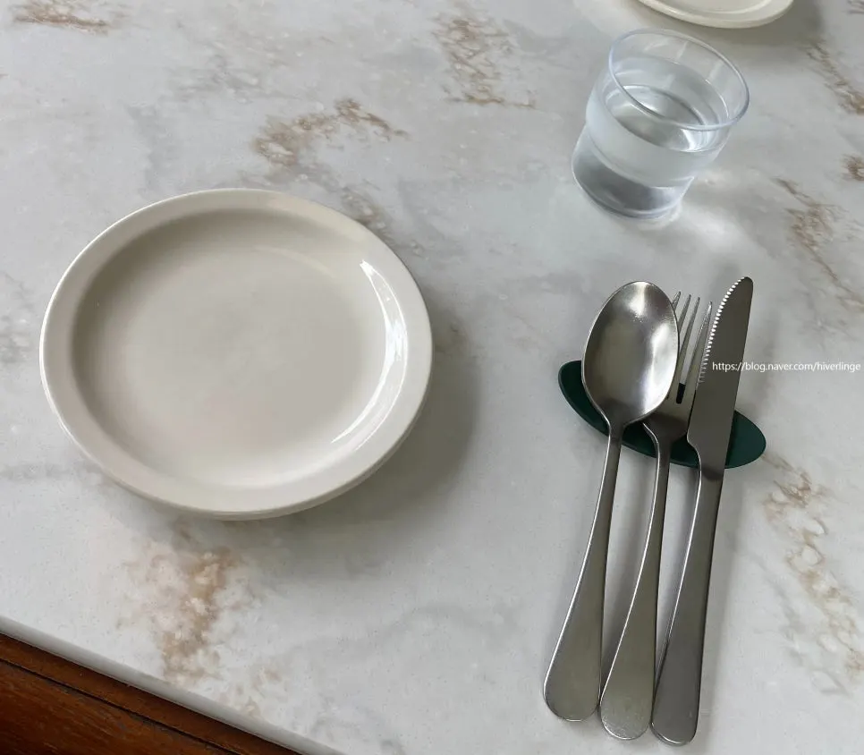 Table setting and order details at Upstairs Kitchen