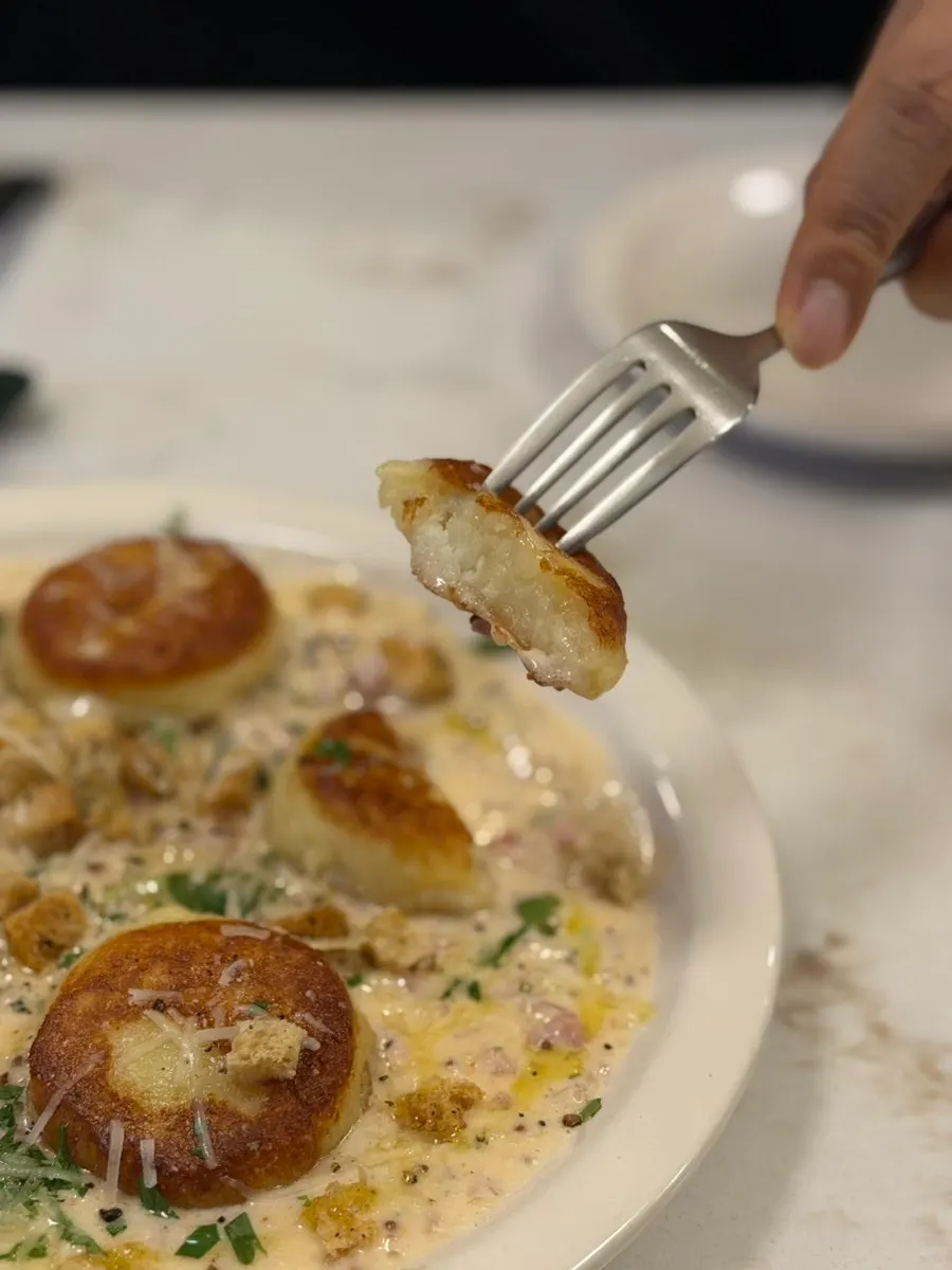 Gnocchi picked up with a fork
