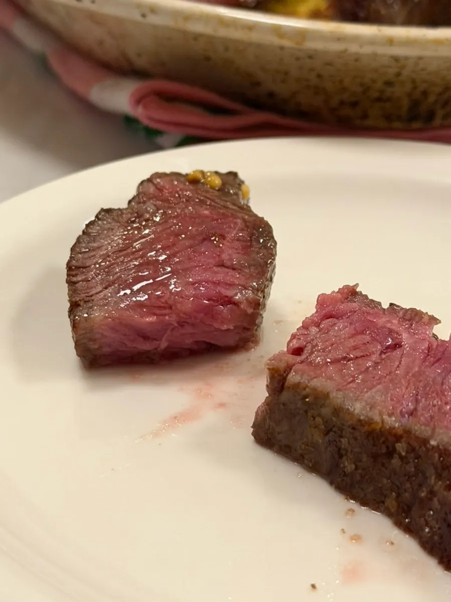 A piece of steak picked up