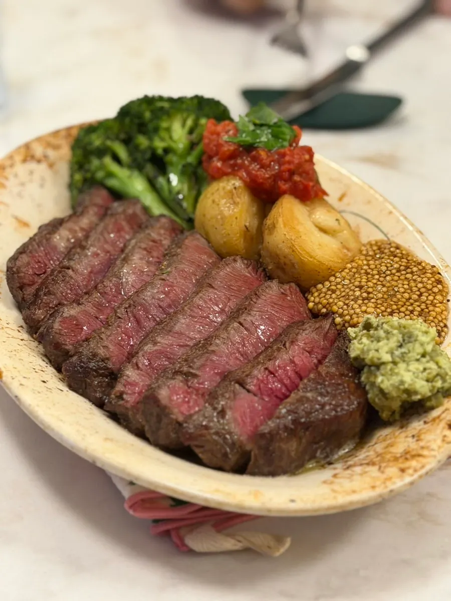 Steak served with whole grain mustard sauce