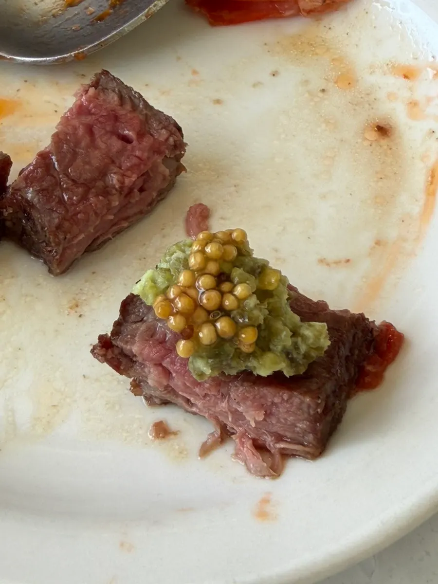 Steak served with whole grain mustard sauce and chili wasabi sauce