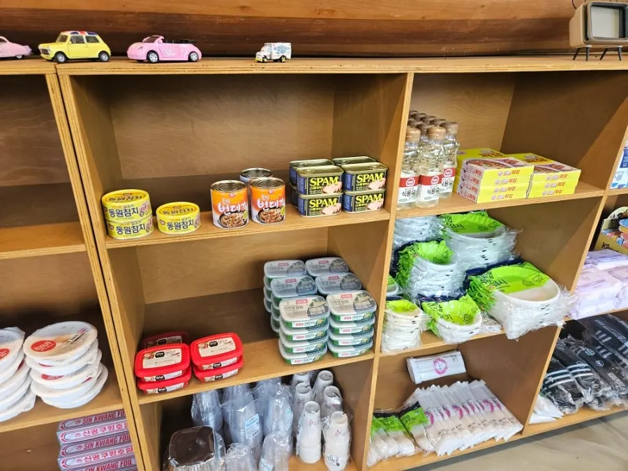 Disposable items and bagged ramyeon on display in the unmanned store