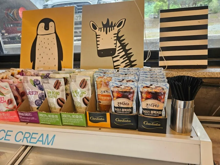 Store shelf with snacks and coffee drinks