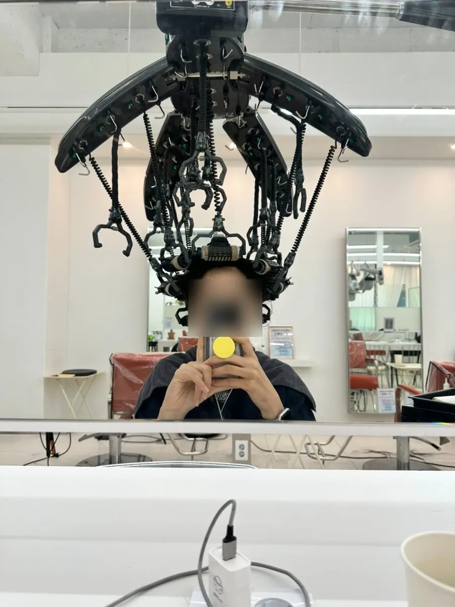 Rods wound in during the perm process to set the curls