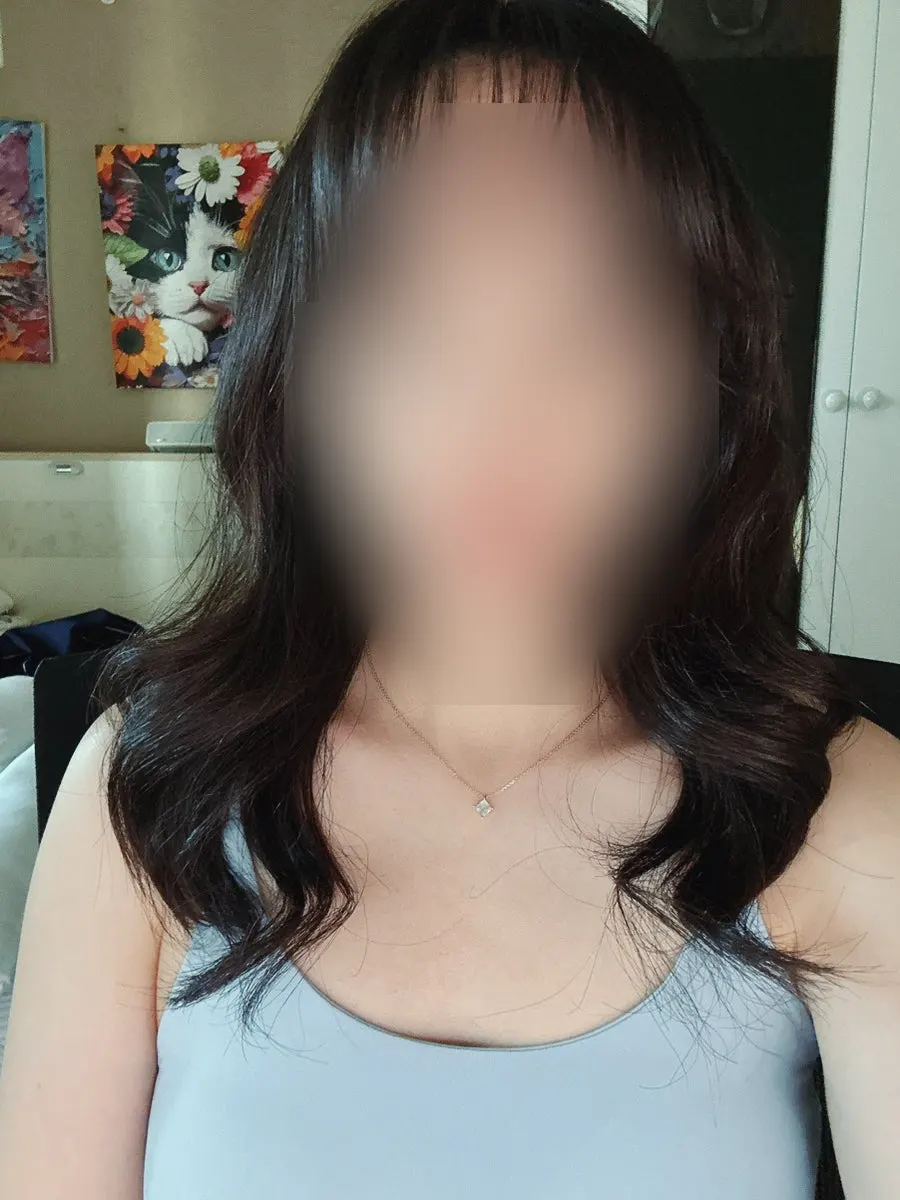 Side view of the bouncy revived perm curls